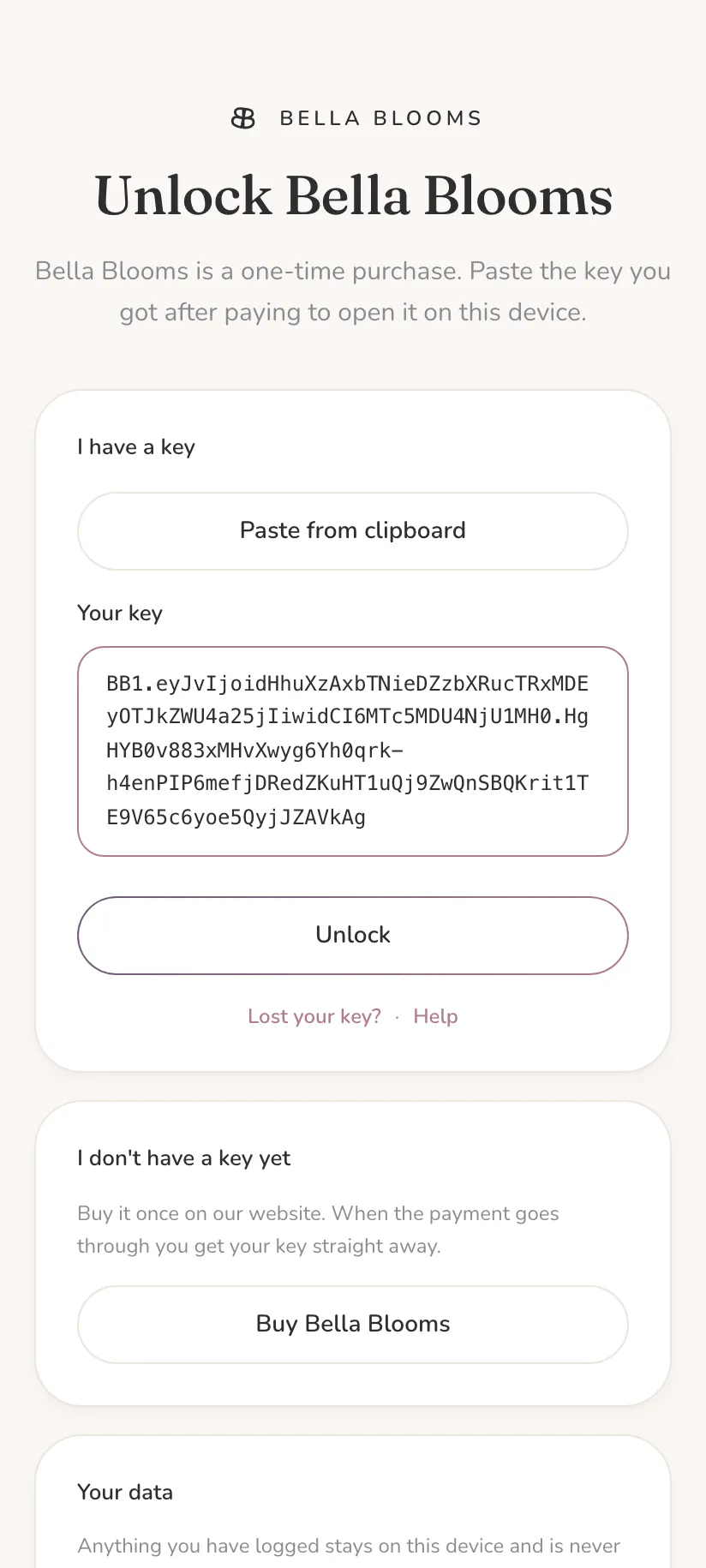The Bella Blooms lock screen, "Unlock Bella Blooms", with a Paste from clipboard button and a key pasted into the box above the Unlock button.